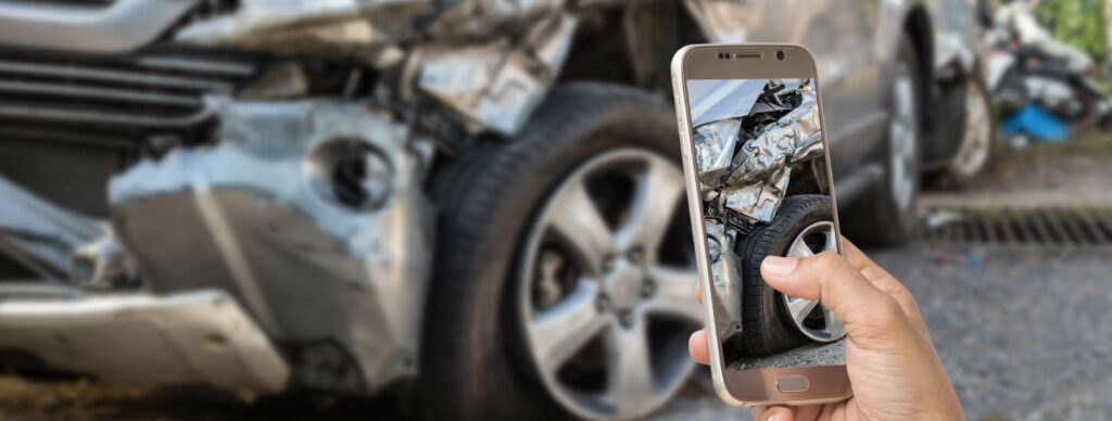 taking photos at scene of an auto accident