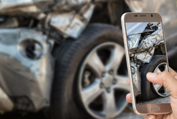 taking photos at scene of an auto accident